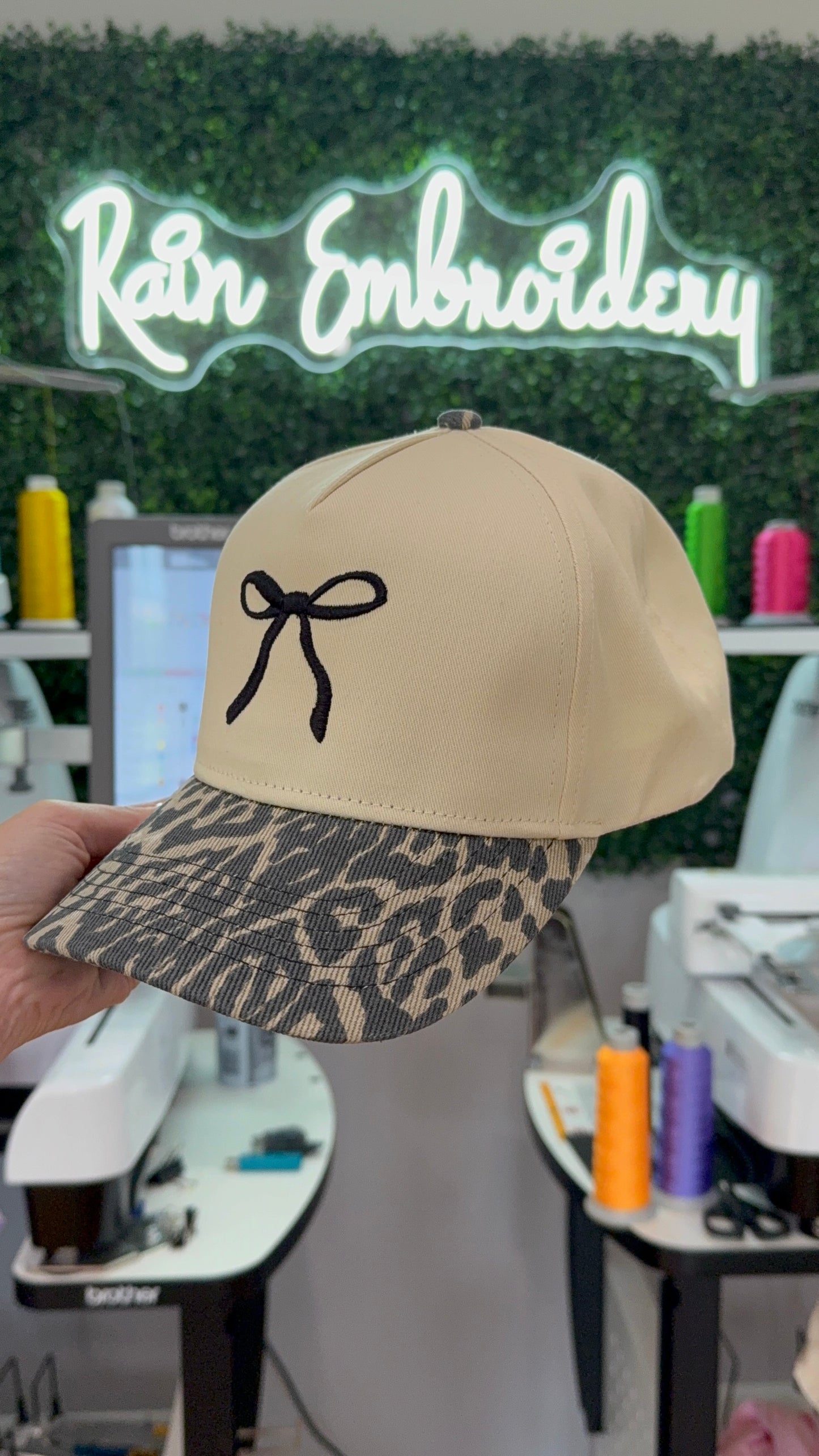 Black Bow Embroidered Leopard Trucker Hat